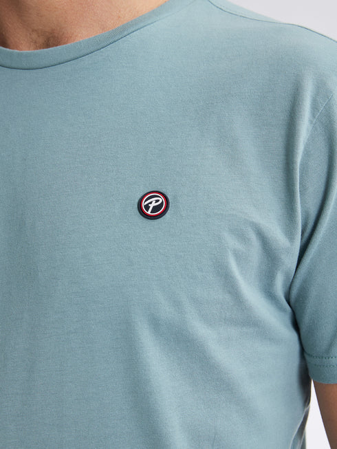 T-shirt with round neckline and short sleeves.